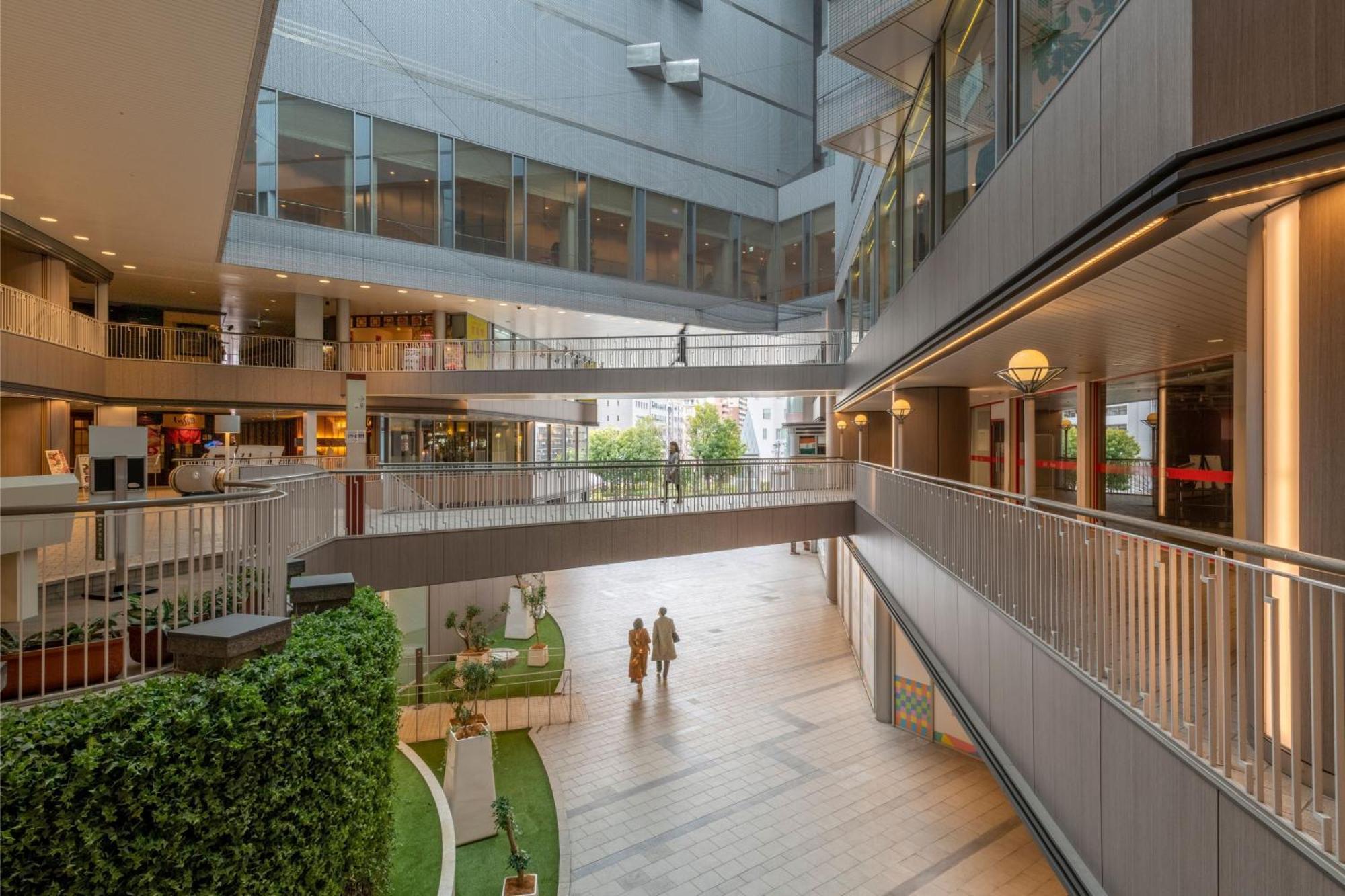 Ana Crowne Plaza Kobe By Ihg Hotel Luaran gambar The atrium of the new building